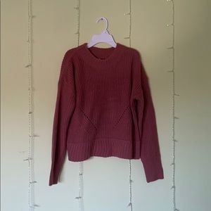 Dark magenta knitted sweater with hole design